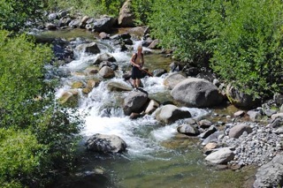 fisherman in creek